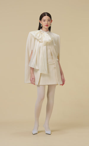 
            
                Load and play video in Gallery viewer, WHITE BEADED KNIT CAPE
            
        