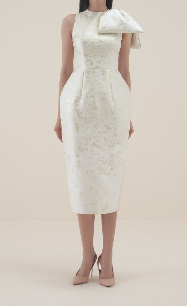 
            
                Load and play video in Gallery viewer, BROCADE BOW DRESS - CREAM
            
        